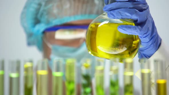 Biologist Marking Flask With Biofuel Alternative Fuel Research Nature Protection