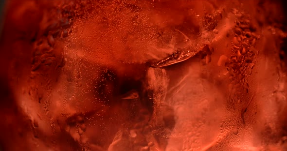 Macro Shot of the Dark Cocktail with Cola and Ice