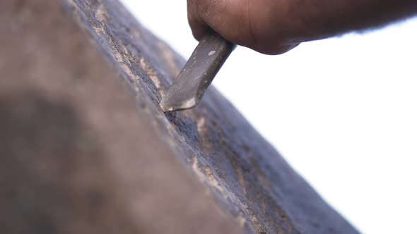 Ancient Man Cave Painting and Writing Historic Inscription Graffiti on Rock Surface With Iron Chisel