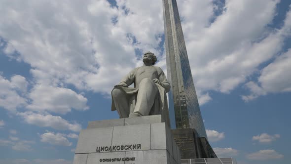 Monument to Tsiolkovsky Next to Stella of a Rocket Taking Off at VDNKh in Moscow