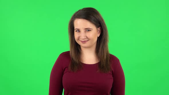 Portrait of Pretty Girl Smiling While Looking at Camera. Green Screen