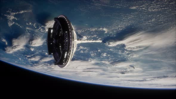 Futuristic Space Satellite Orbiting the Earth alt