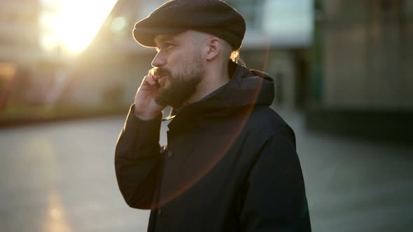 Portrait in Profile of a Mustachioed and Bearded Man in a Cap