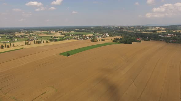 Drone fly over the lake and fields. High quality 4k footage