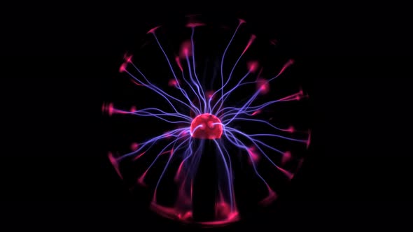 A plasma globe is seen electrifying with blue and red colors.