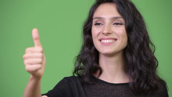 Young Beautiful Woman Giving Thumbs Up