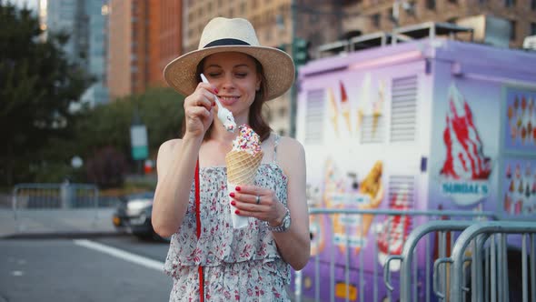 Young girl eating ice cream 