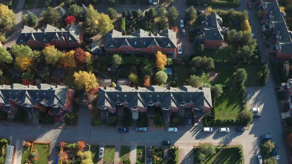 Cosy Townhouses Surrounded By Colorful Autumn Trees