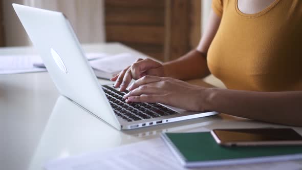 Black Woman Entrepreneur Sit at Desk Typing on Laptop Closeup Spbd