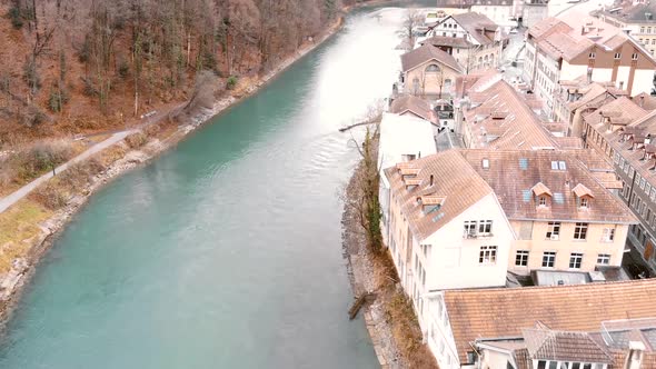 Fly over Aare River, aerial view of Bern Old City. Tourism in Switzerland
