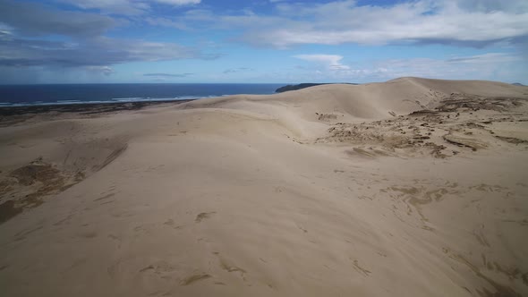 Aerial over giant coastal sand dunes