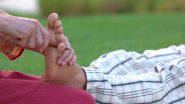 Reflexology Foot Massage To Man