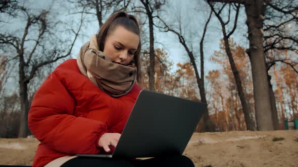 Girl works in the park