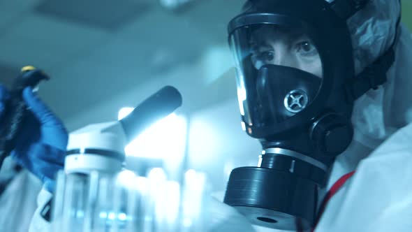 Laboratory Worker Is Preparing a Sample for the Analysis