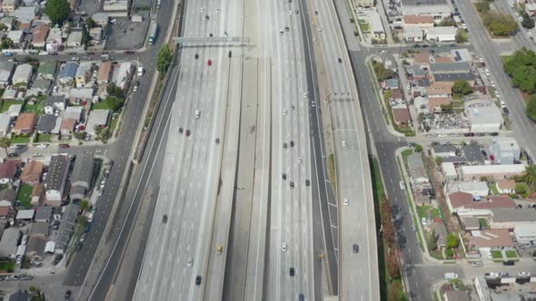 AERIAL: Slow Overhead Lookup Over 110 Highway with Little Car Traffic in Los Angeles, California on