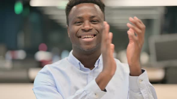 Portrait of African Businessman Clapping Applauding