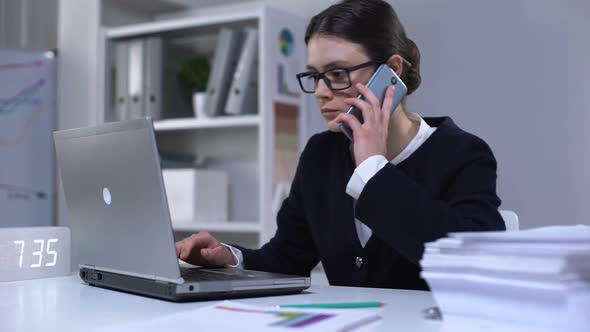 Overworked Businesslady Answering Phonecall, Unhappy With News, Stressful Job