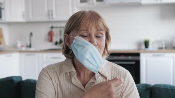 Woman Take Off Virus Mask From Her Face And Breathes Fresh Air