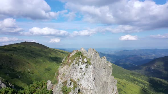 Aerial view of rocky peak of Spitz mountain in the Carpathian mountains, landscape