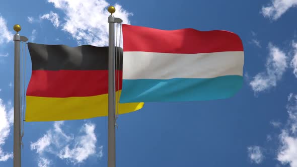 Germany Flag Vs Luxembourg On Flagpole