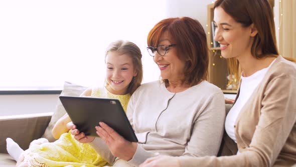Mother, Daughter and Grandmother with Tablet Pc