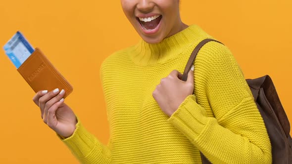 Smiling Female Student With Backpack Showing Passport Travel Tickets, Vacation