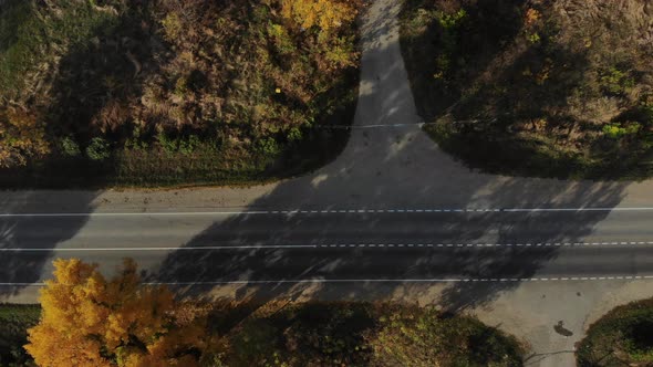 View of the transportation from the air. Aerial view of the asphalt road.