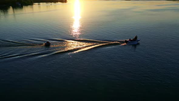 Rest on river by boat. Aerial view of motor boat floats on the river