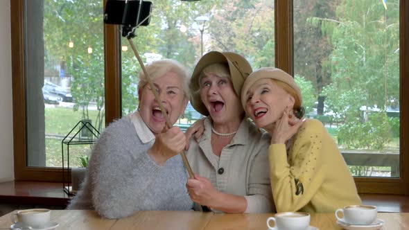 Three Women with Selfie Stick