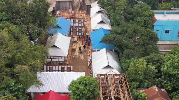 Aerial view of a small residential district with houses in Baishmouja, Brahmanbaria, Bangladesh. alt