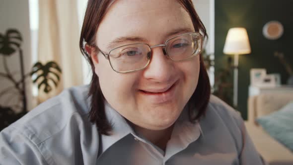 Portrait of Happy Man with Down Syndrome