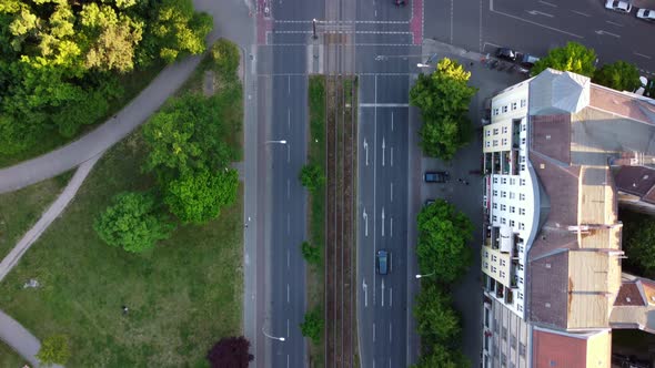 Cars drive in both directions on Prenzlauer Allee cyclists Stunning aerial view flight bird's eye v