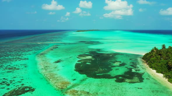 Luxury drone clean view of a white sand paradise beach and turquoise sea background in colourful 