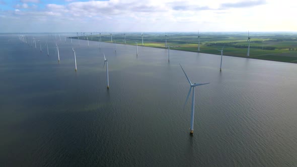 Wind Turbines in the Early Morning Wind Mill Park in the Netherlands