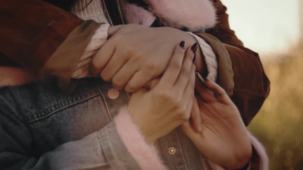 Close Up Of Couple Hug Outdoor at Sunset