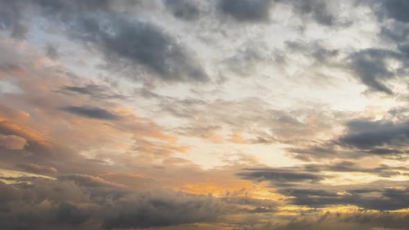 Time Lapse Footage of Fast Moving Evening Clouds on Yellow Sky at Sunset