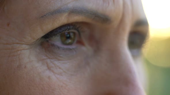 Hopeless Senior Woman Looking Into Camera, Worrying About Future, Close-Up