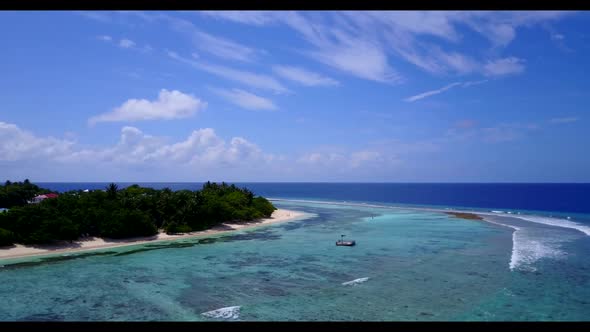 Aerial top view abstract of tranquil shore beach voyage by blue green ocean with white sandy backgro