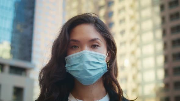 Asian Girl in Mask Posing on Camera Closeup