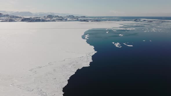 Drone Flight Over Sea And Icy Coastline By Sissiiut