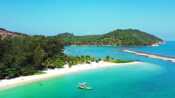 Aerial top down texture of idyllic tourist beach time by clear lagoon and bright sand background of 