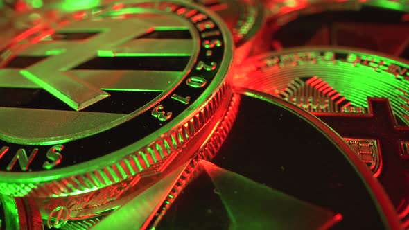 Macro Shot of Crypto Money Super Close Up, Litecoin with Bitcoin and Etherium Light with Green and