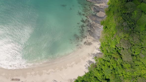 Drone footage of beautiful paradise beach. Movement from right to left. Nui Bay, Koh Lanta, Thailand