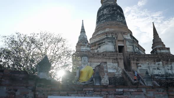 Sunset Over Wat Yai Chai Mongkhon Buddhist Temple in Ayutthaya Thailand  Gimble Panning