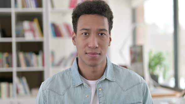 Serious Young African American Man Looking at the Camera 