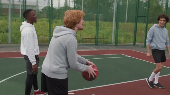 Man Making Basket during Friendly Streetball Game