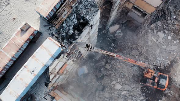 Destroying Old Concrete Building Using Mechanical Arm