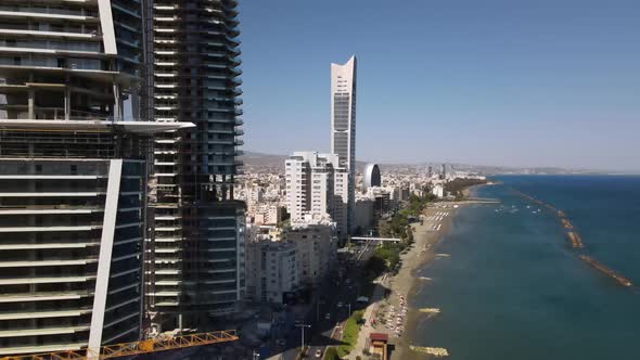 Embankment of Limassol in Cyprus. Modern architecture and old town. Skyscrapers.