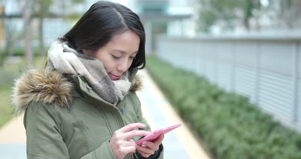 Woman use of smart phone at outdoor