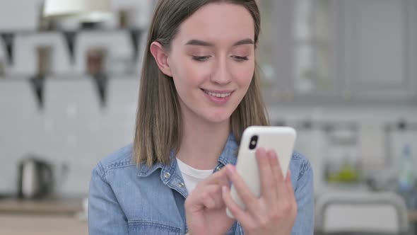 Portrait of Attractive Young Creative Woman Using Smartphone